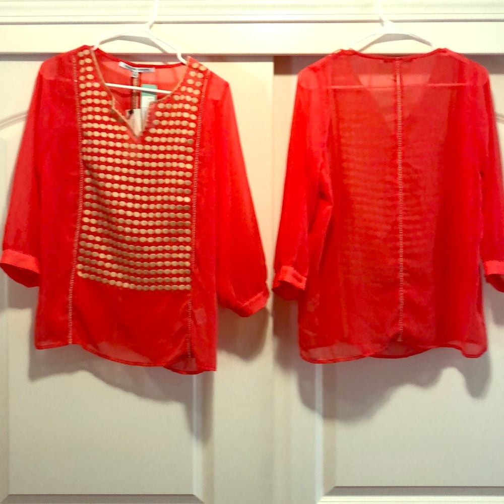BRAND NEW embroidered split neck blouse.